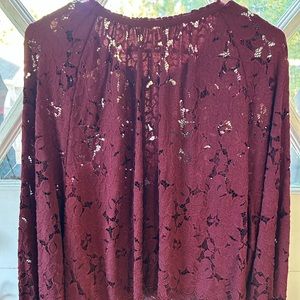 Gorgeous lacy rich plum color with oval back cut out
